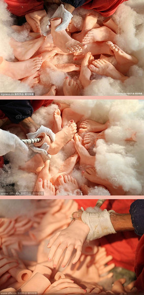 worker stuffs the feet of sex dolls with cotton