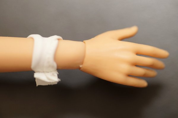 Detacheable hand in a Phicen doll.