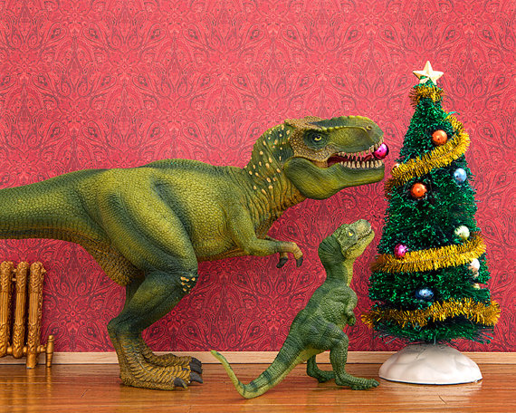 T-rex adding ornament to Christmas tree.jpg