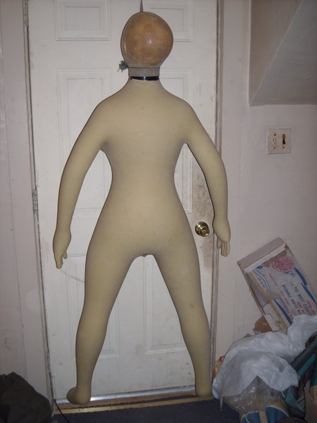The head on the doll is only for inflating the body and to be removed after I make a new head mold.
