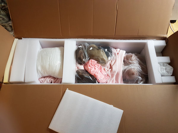 Unboxing: Goodies ontop of doll (cant wait to open!)