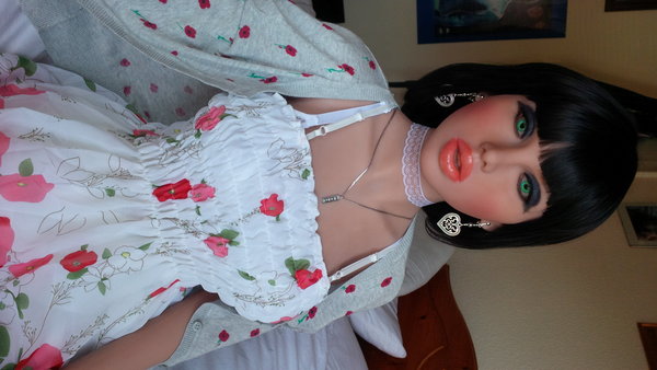 All change today with new short black wig and summer dress, this is a size 6 and fits just right, her that is!
