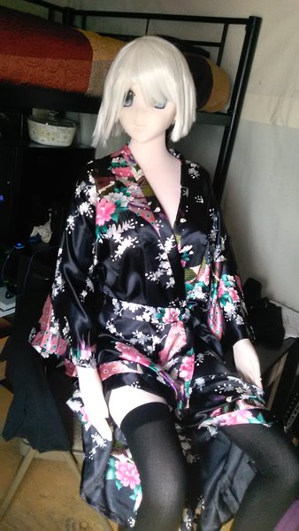 Got her a flowery Kimono on Amazon for 5 bucks.  Its pretty great.
