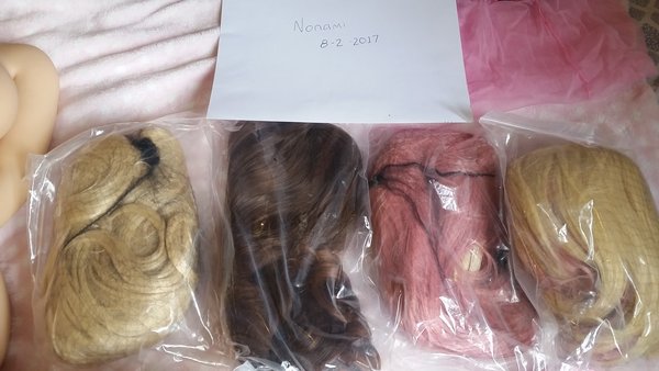 4 Wigs, Blone, Blonde (curly w/ Pink tips), Brunette, Pink