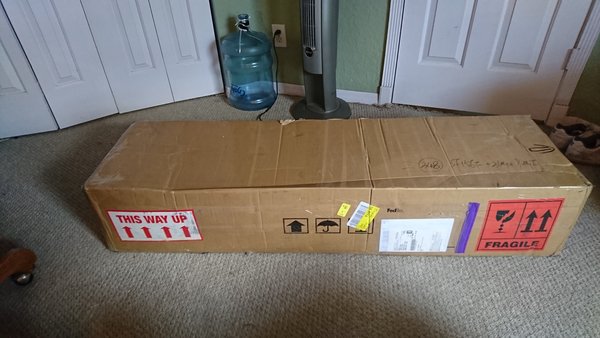 The box arrived undamaged and was in the FedEx truck with arrows pointed in the right direction.