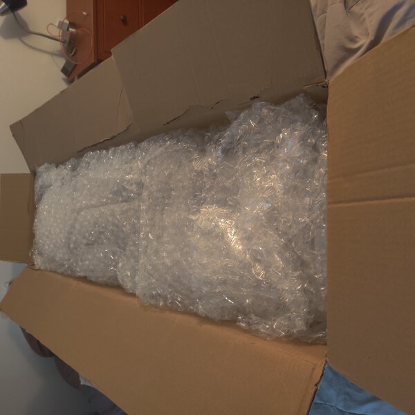 Packing was VERY through, cat loves the bubble wrap by the way.