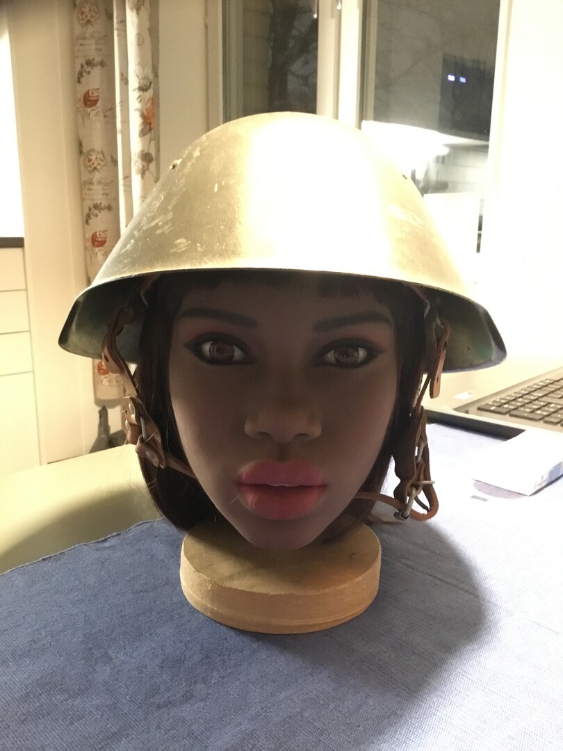 Penny in eastgerman steelhelmet.JPG