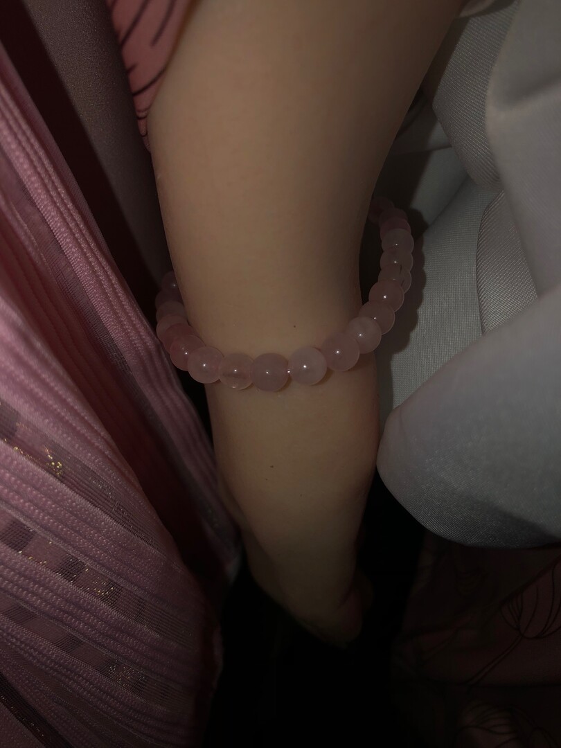 Rose Quartz bead bracelet worn.jpg