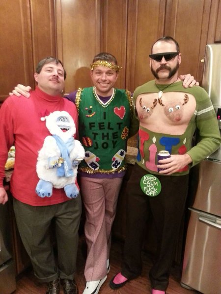 3 party guys in ugly Christmas sweaters.jpg