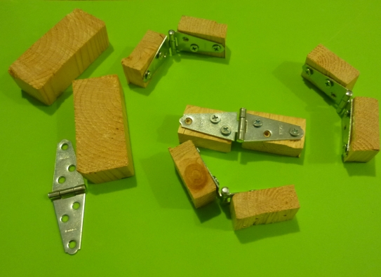 Strap hinges on wood scraps