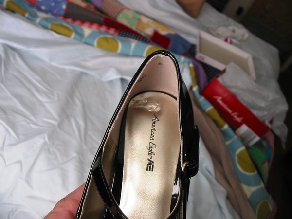 Sanae has stood in these shoes only twice, note the damage already.