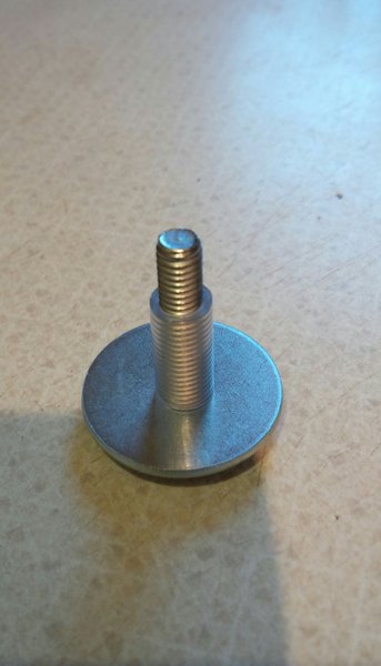 Foot bolt with added washer and plastic tubing