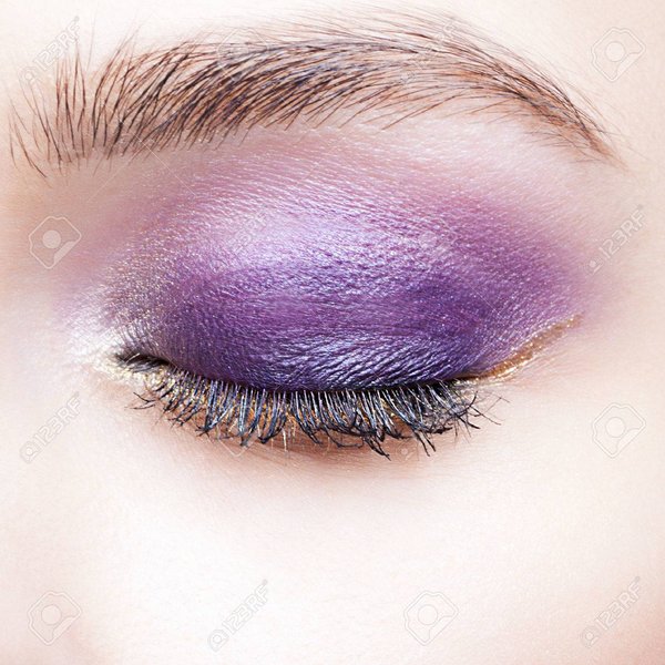 37564736-closeup-shot-of-woman-closed-eye-and-brows-with-violet-eyelid-day-makeup-Stock-Photo.jpg