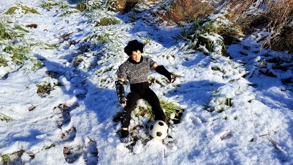 Tom playing snow ball.jpg