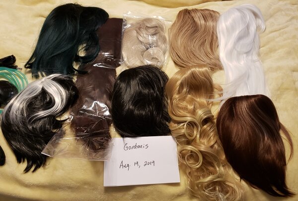 Some of these wigs including the two the dolls are wearing are premium wigs purchased from a wig shop worth more than a $100 each.