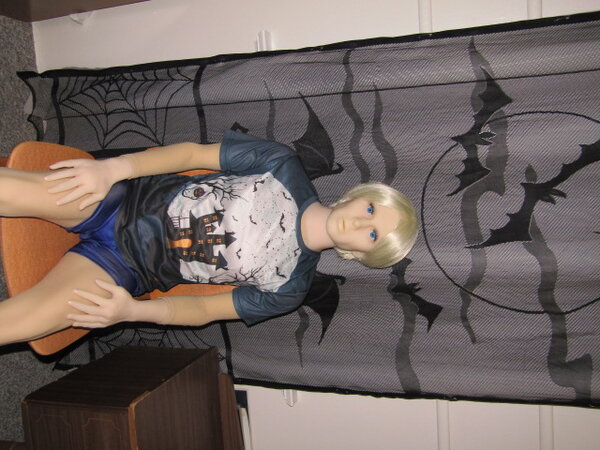 Erik: &quot;You chose a great spot for our photos, True - this curtain is the perfect background for our Halloween shoot.&quot; True: &quot;Yes, indeed. I'm so glad we can finally share photos with other members of the Forum. And the shirt I ordered looks great on you.&quot;